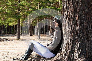 Lonely woman in helmet of the pilot