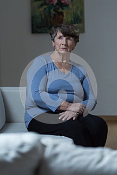 Lonely women in an empty house