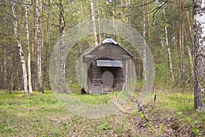 A lonely wooden hut in the forest