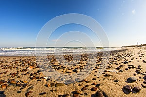 Lonesome beach of the Baltic Sea with pebbles