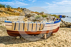 Lonesome boat on the beach