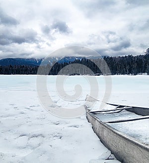 Lonesome boat on a frozen Lonesome Lake