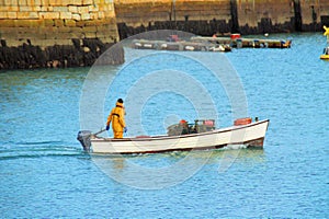 The Lonesome Boatman In Howth Harbour