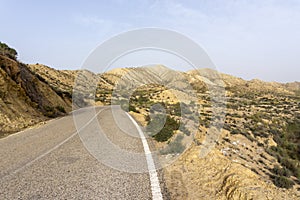 Lonesome highway leading into the Tabernas Desert in Andalusia