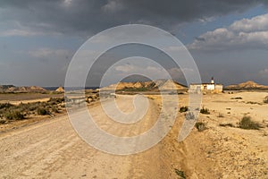 Lonesome hunting cabin in wild and secluded desert grasslands photo