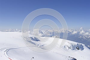 Long alpine skiing track n the very top of Swiss Alps