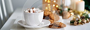 Long banner cozy wintertime scene. Christmas holiday background with cup of hot cocoa marshmallow