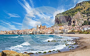 Long beach and blue sea near Cefalu, Sicily, Italy