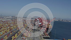 Long Beach, California, USA - October 20th, 2021: Intermodal vessels unloading hundreds of shipping containers in port of Long Bea