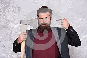 Long beard is style for him. Bearded man hold razor and axe. Beard grooming tools. Beard barber. Vintage shaving. Retro