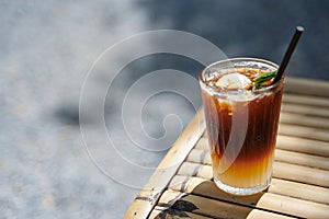Long black coffee mixed with Lychee on nature background. iced drink menu of summer drink for relaxing day
