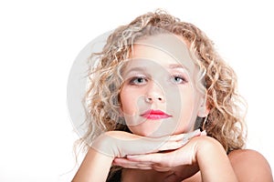 Long blond curly hair of young attractive woman