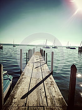 Long boat bridge at the lake