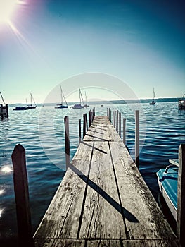 Long boat bridge at the lake