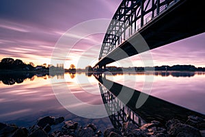 Long bridge at sunset in the Netherlands