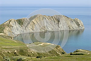 Long cape surrounded with calm sea