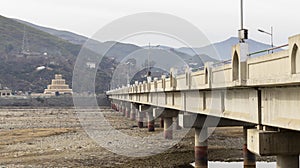 Long concrete bridge on a river