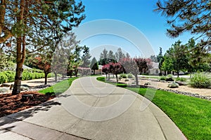 Long concrete driveway of American luxury house