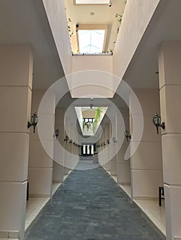 Long corridor with columns and skylight