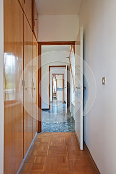 Long corridor in country house interior