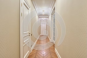 Long corridor with illumination in luxury house