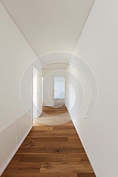 Long corridor with parquet floor