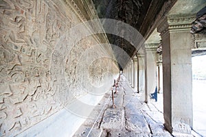 Long corridor of pillars in temple ruins, Angkor Wat in Cambodia