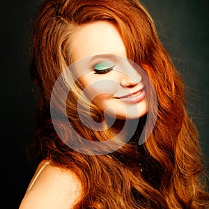 Long Curly Red Hair. Fashion Woman Portrait
