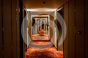 Long dark corridor in a luxury hotel
