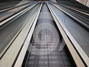 Long descending travelator