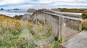 Long descending wooden stairway to public ocean beach