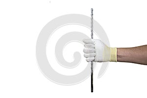 Long drill in the hand in white glowe on white background isolated.