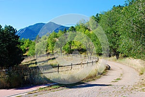 Long Driveway With View of Mountains and Trees