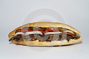 Long DÃ¶ner sandwich lamb or beef  meat or SandviÃ§ dÃ¶ner isolated on a white background