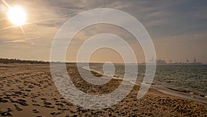 Long empty clean sand Stogi beach in Gdansk, Poland.