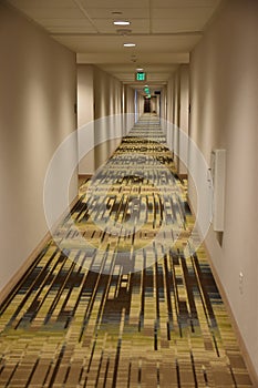 Long endless hotel corridors give a sense of loneliness