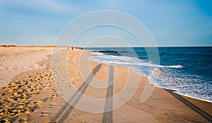 Long evening shadows on the beach at Cape May, New Jersey.