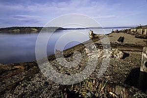 Long exposure beach view of Sequalitchew Creek Trail.