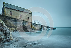 Long exposure. Disused lifeboat station at Polpeor Cove, Lizard Point, Cornwall