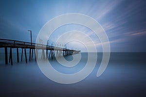 Long exposure of the fishing pier and Atlantic Ocean, in Virginia Beach, Virginia.