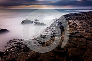Long exposure of the Giants Causeway at sunset