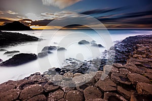 Long exposure of the Giants Causeway at sunset
