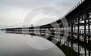 Long exposure of the historic Rio Tinto pier in Huelva photo