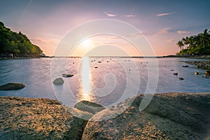 Long exposure image of Dramatic sky seascape with rock in sunset or sunrise sky scenery background Amazing light nature landscape