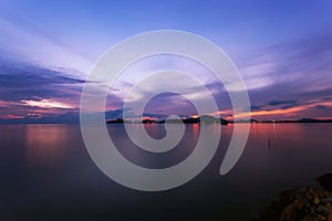 Long exposure image of dramatic sunset or sunrise,sky clouds over tropical sea.