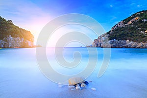 Long exposure landscape of Paleokastritsa famous sand beach in c