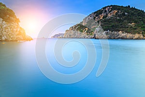 Long exposure landscape of Paleokastritsa famous sand beach in c