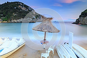 Long exposure landscape of Paleokastritsa famous sand beach in c