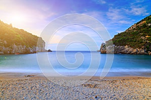 Long exposure landscape of Paleokastritsa famous sand beach in c