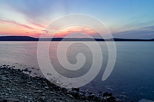 Long exposure landscape scenic view twilight evening river shore line without people here peaceful nature environment space with